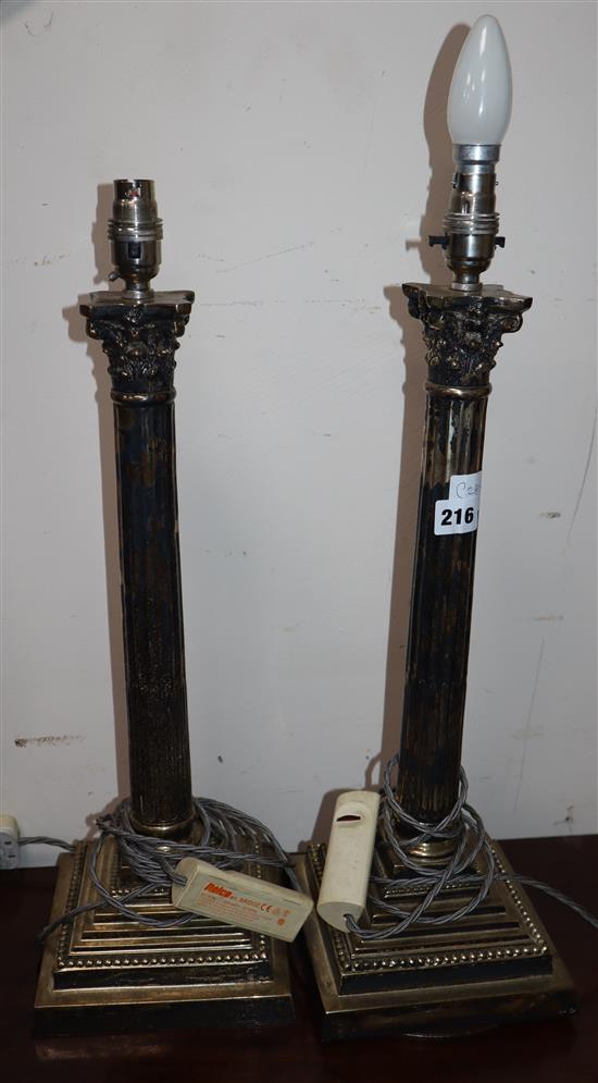 A pair of plated corinthian column table lamps